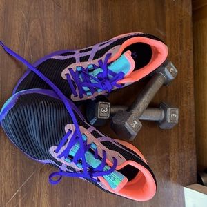 Women’s Size 11 ASICS running shoes.